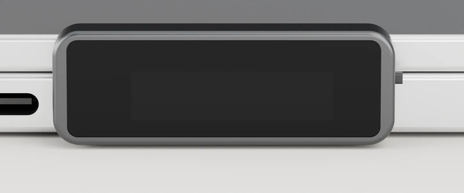 Render: the Possum key on the side of a MacBook. Its screen reads Get the app, trypossum.com/start.